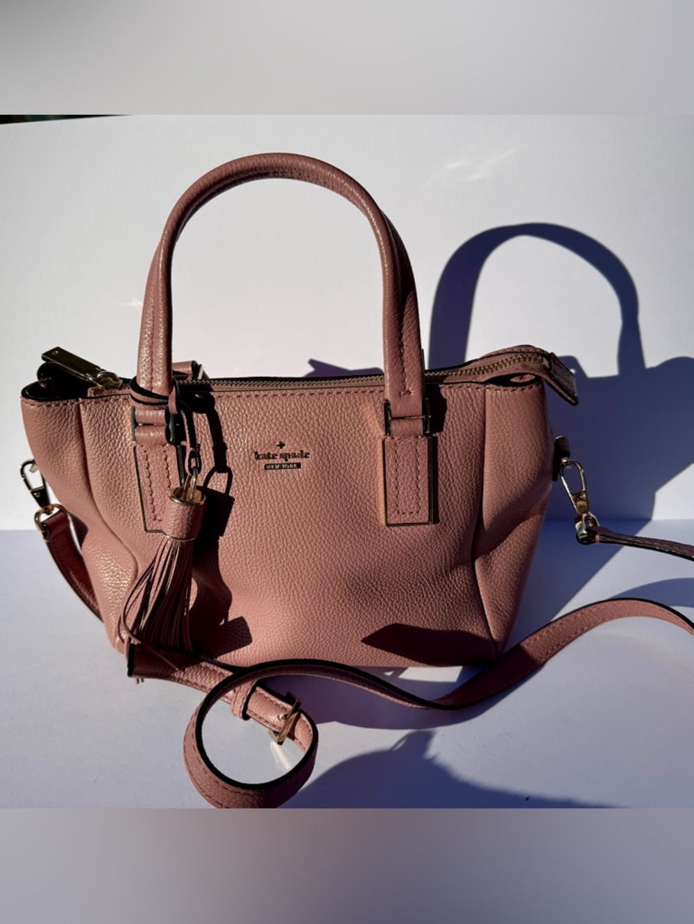 kate spade dusky pink pebbled leather satchel with tassel